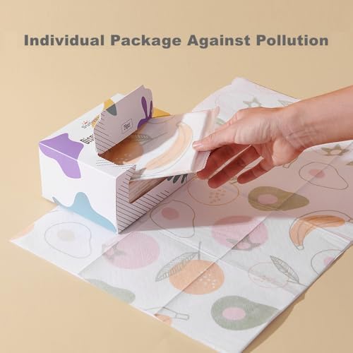 An open diaper bag demonstrating how the compact individually packaged baby feeding travel liners fit into travel kits