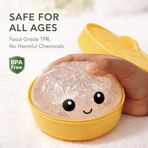 Kangerse white glitter dumpling toy being squeezed to demonstrate its flexible slow rise recovery behavior.