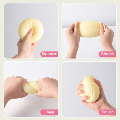 Collectible pink mystery dumpling toy resting next to its decorative plastic steamer box cover