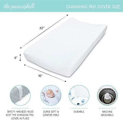 Side view showing the safety strap buttonholes on the premium imported infant changing pad sheet