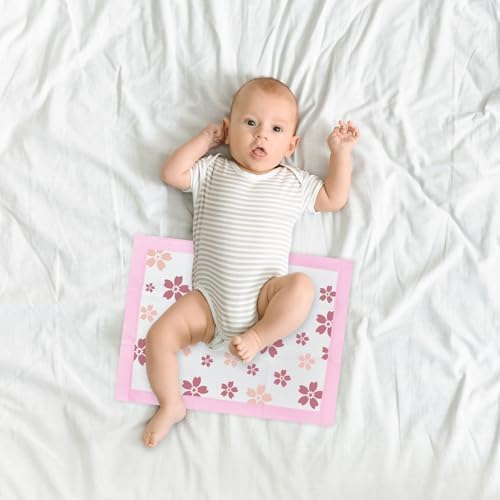 Waayaa cherry blossom changing pads stacked for use