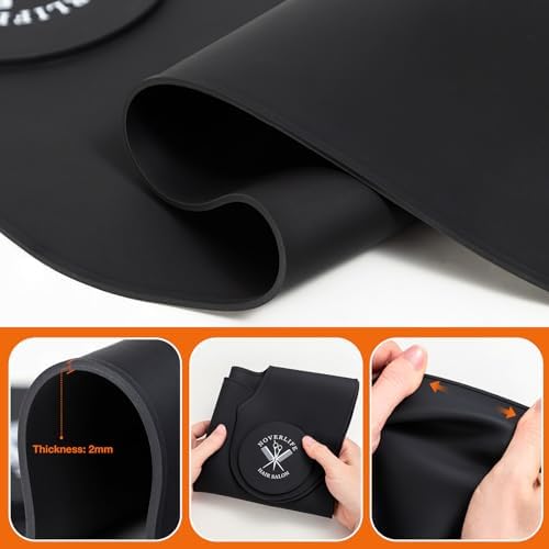 Water droplets shedding off the waterproof black hairdressing neck guard.
