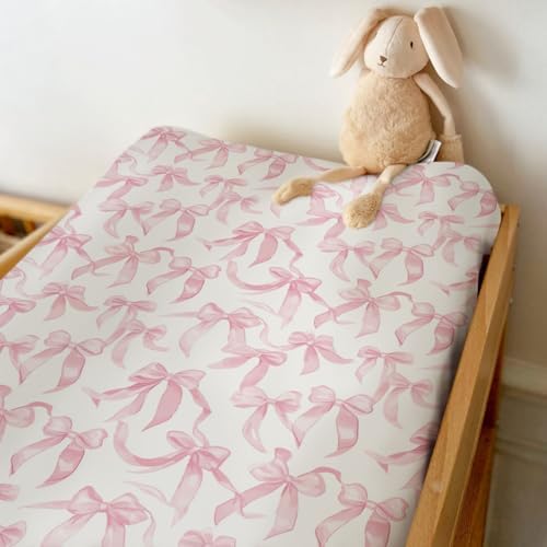 Close up of soft silky polyester fabric texture on changing pad cover.