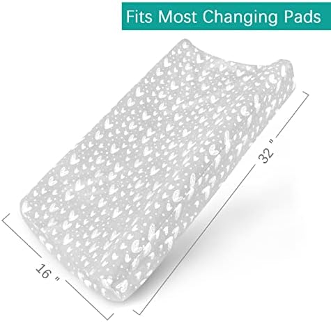 Biloban star pattern baby bedding fitted sheet stretched over standard changing pad