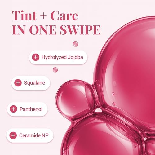 Close up view of the product bottle highlighting the hydrating ingredients jojoba oil and squalane.