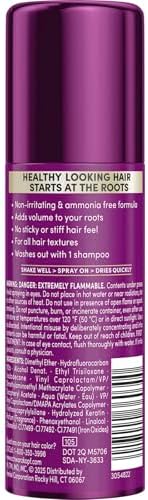 Textured hair after using Schwarzkopf volume boosting root spray
