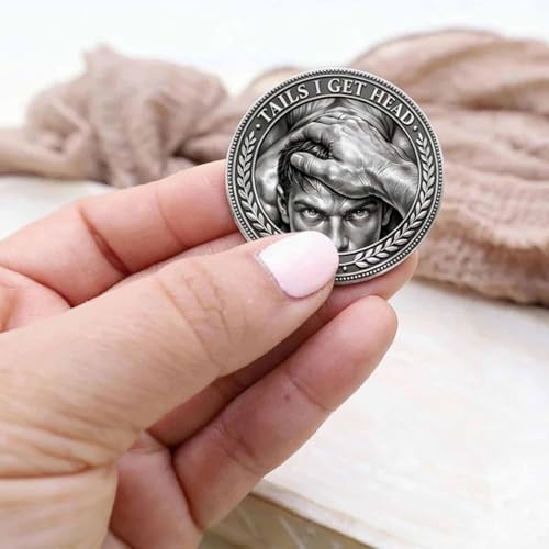 Godnheart relationship decision coin held in hand showing forty millimeter scale