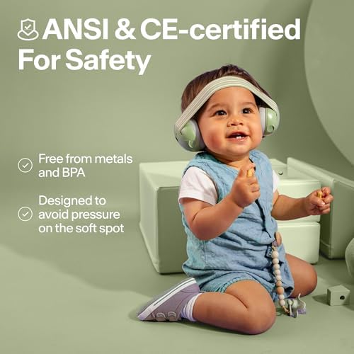 Baby wearing Alpine Muffy ear protection in public
