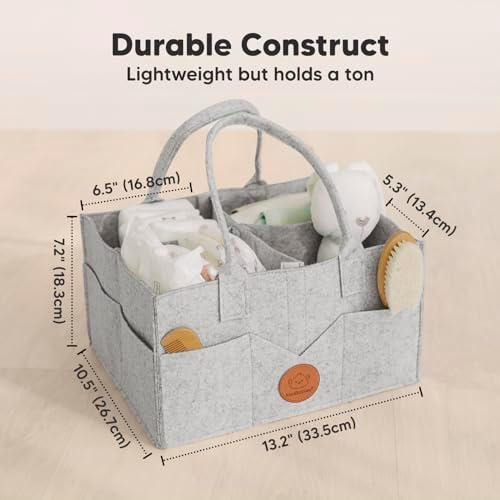 Side view of KeaBabies portable nursery storage basket with side pockets