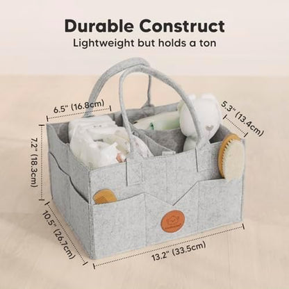 Side view of KeaBabies portable nursery storage basket with side pockets