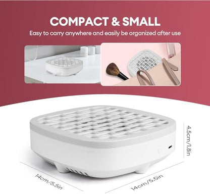 Compact nail dust collector showing USB power cable connection.