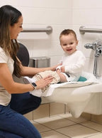 Teal portable potty training seat folded for travel