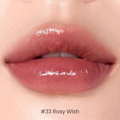Close up view of the transfer resistant lip gloss formula applied on lips showing the dewy gradient look.