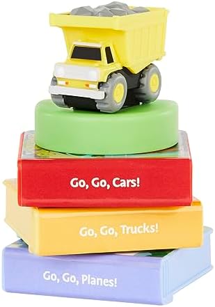 Toddler using the vehicle story cassettes with the interactive wall projector toy.