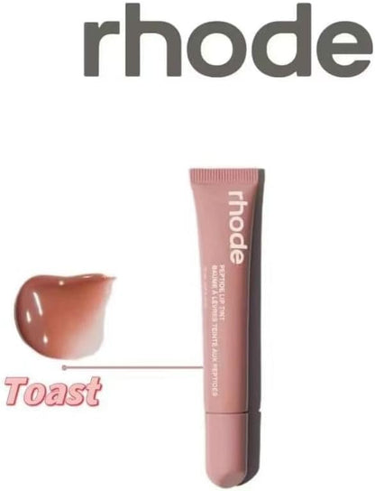 Rhode Toast lip tint tube showing sheer glossy color swatches