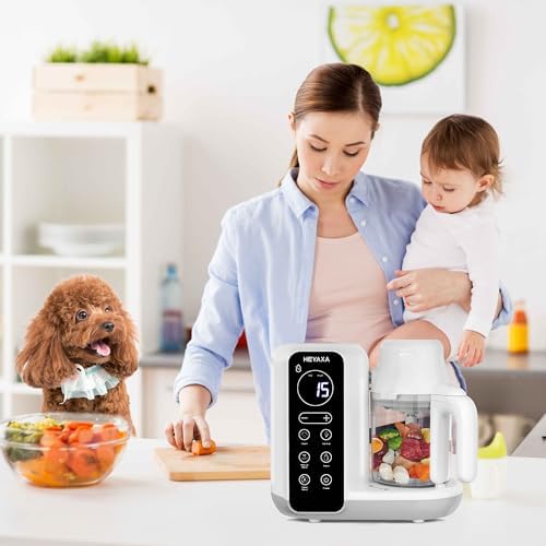 Multi functional baby bottle warmer and food processor on a kitchen counter
