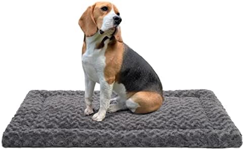 Exsnugy plush dog crate pad laid flat inside a standard metal pet kennel.