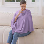Mother using Zdolmy nursing cover for breastfeeding