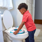 Close up view of the extra soft padding on the blue toddler potty seat