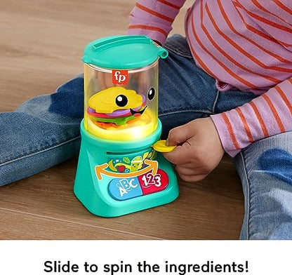Fisher-Price musical blender toy packaging detailing learning features for age nine months plus.