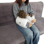 Parent using Povenk cozy cradle pillow for breastfeeding