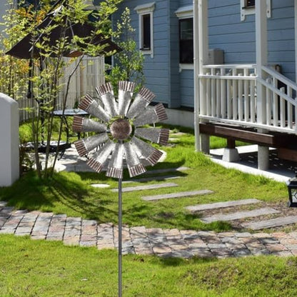 Viveta metal windmill spinner installed in garden soil