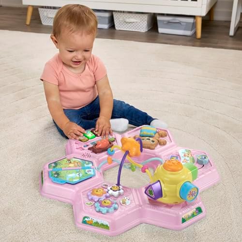 VTech interactive learning station details emphasizing the mechanical flower gears and sliding forest friend beads.