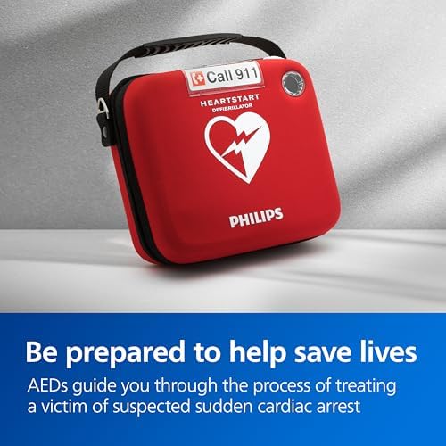 HeartStart HS1 AED showing green pull handle for emergency activation