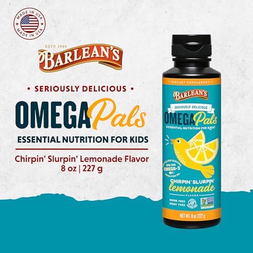 Child-friendly omega 3 emulsified liquid poured on a spoon showing creamy texture