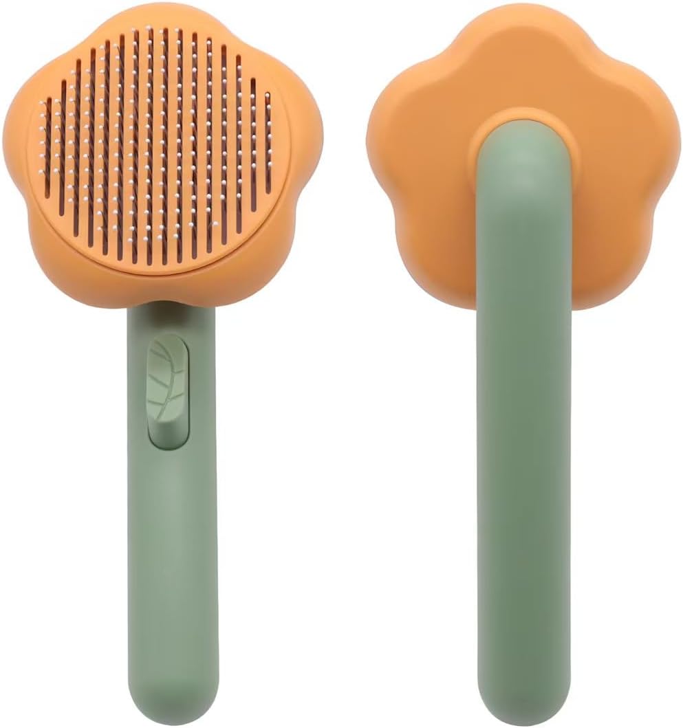 Mixen 4-in-1 flower-shaped cat grooming comb front view showcasing orange and green misting head.