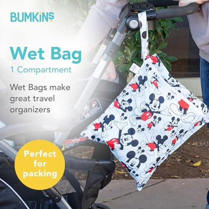 Bumkins wet bag attached to a stroller handle