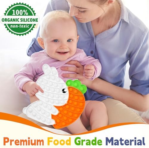 Silicone rabbit and carrot puzzle pieces separated on a plain background
