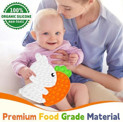 Silicone rabbit and carrot puzzle pieces separated on a plain background
