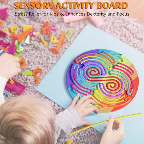 Spkwis double sided silicone busy board being used by a child for quiet tactile play.