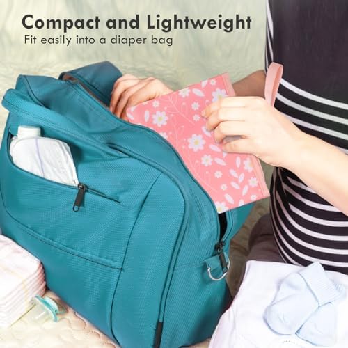 Phoebus Baby changing pad attached to stroller with wrist strap