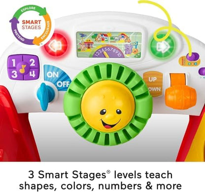 Fisher-Price infant play center side view showing shape sorting door and blocks