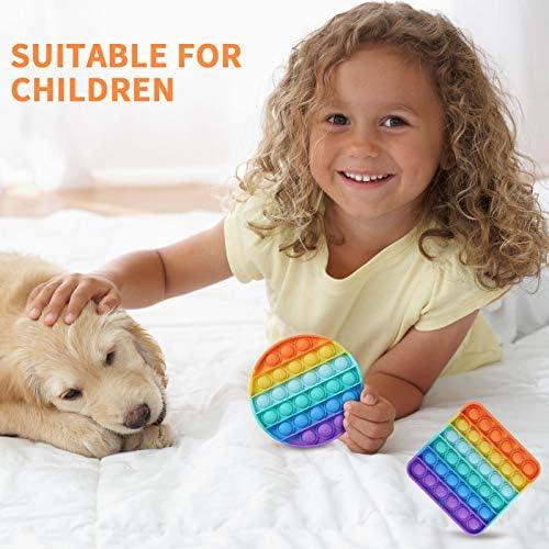 Durable waterproof silicone fidget game being washed under running tap water