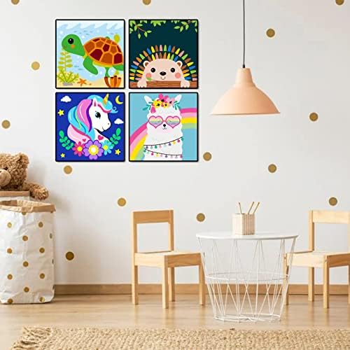 Close up of a child painting a cute cartoon turtle on an eight inch canvas.
