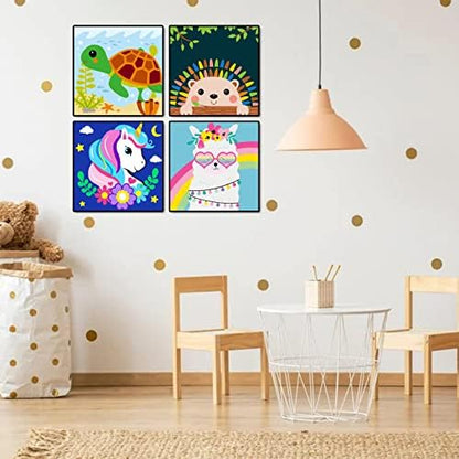 Close up of a child painting a cute cartoon turtle on an eight inch canvas.