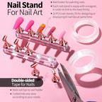 Close up of dual-ended metal dotting tools for nail design