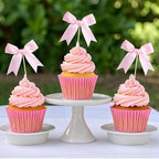 Professional cake styling using Ephlyn pink bow toppers