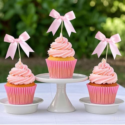 Professional cake styling using Ephlyn pink bow toppers