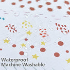 Womumon kids spill mat used as a protective tablecloth during arts and crafts painting session