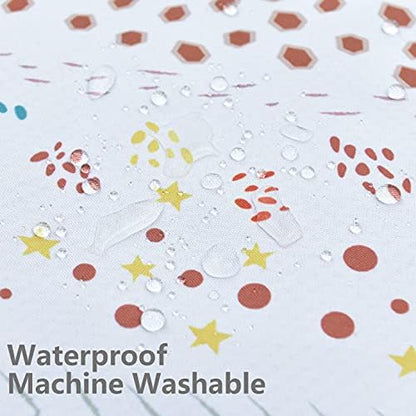 Womumon kids spill mat used as a protective tablecloth during arts and crafts painting session