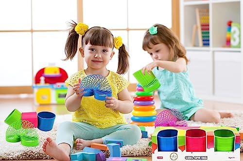 Vibrant eighty millimeter neon plastic spring toys stretched out for sensory play