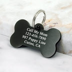 Durable dual sided engraved pet name tag attached to a large dog collar.