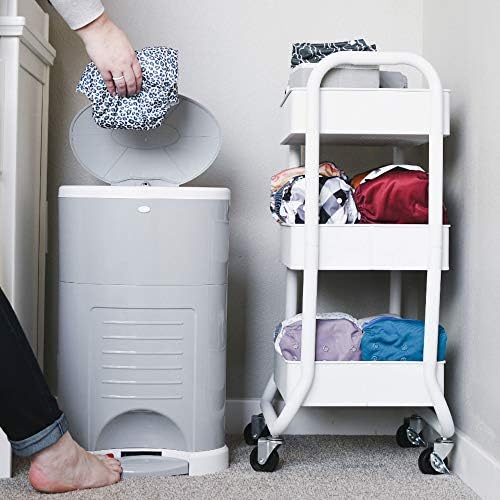 Lifestyle shot showing hands free step and drop operation with cloth liner