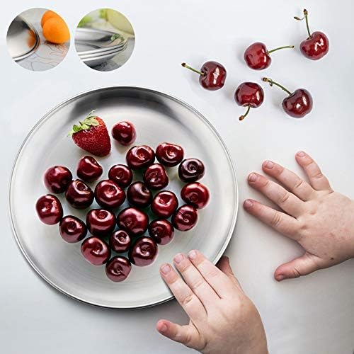 Toddler eating from 8 inch stainless steel plate