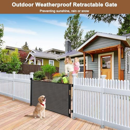 BETERTEK retractable baby gate safety lock close up mechanism being operated with one hand