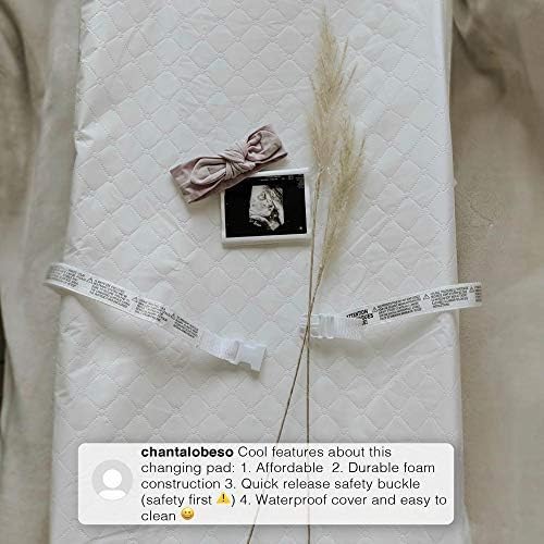 Delta Children waterproof changing pad angled view showing contoured sides